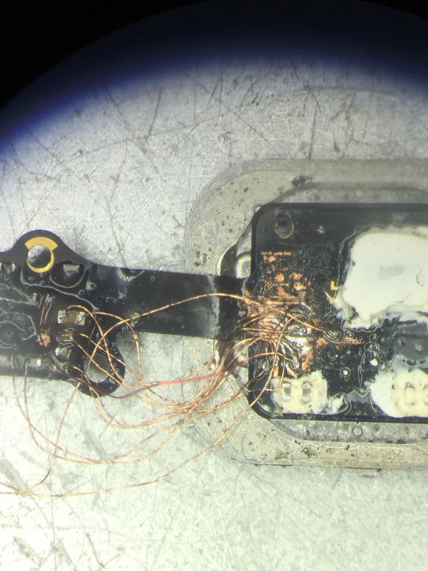 jumper fingerprint iPhone 6 rusak di microscope